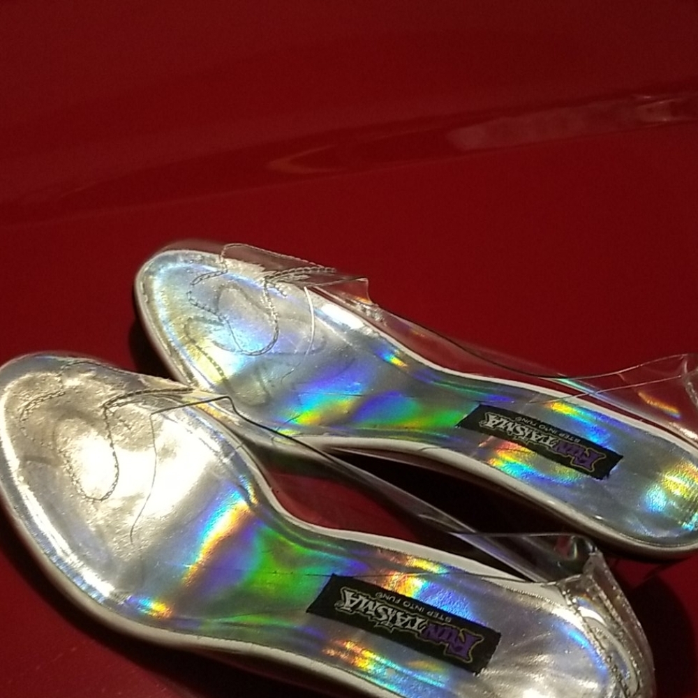 Clear high heeled shoes never worn